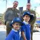 Andres, 6, and Jack, 8, Velasquez-Heaton with Daniel Healy and Michael Darling from the 41st Battalion. Picture by Cathy Adams