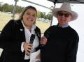 Lismore's Tara Coles with Taree Show's long-time announcer Bruce Moy. Scott Calvin picture.