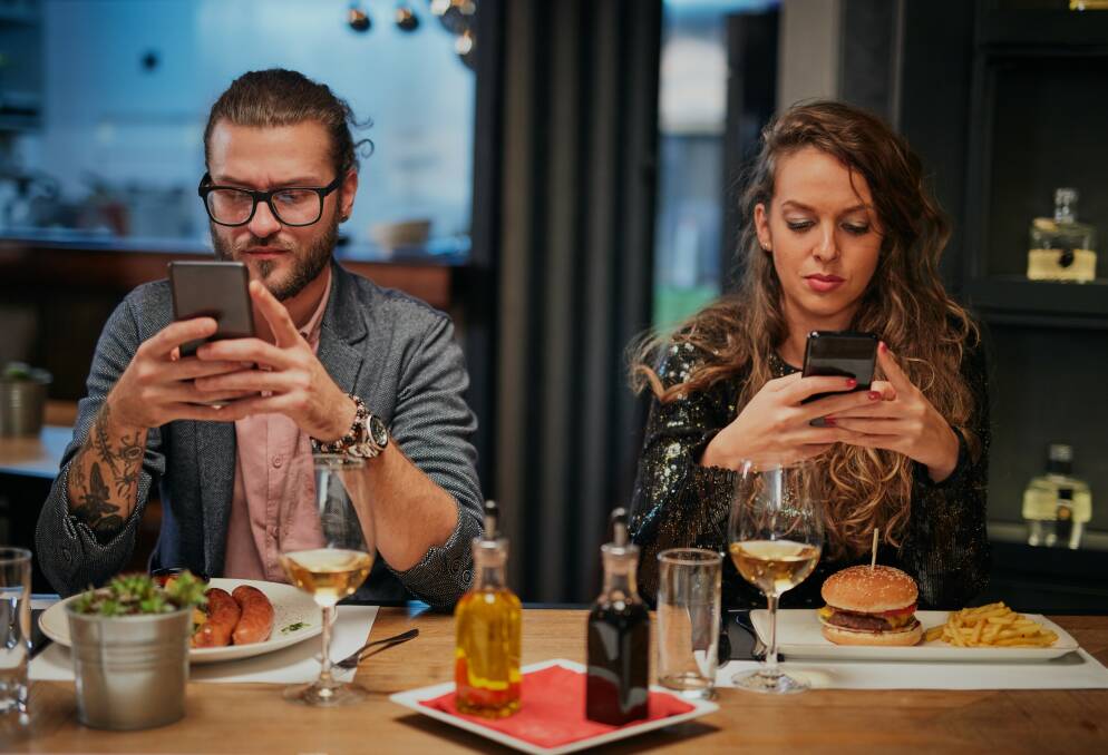 Some 64 per cent of iPhone users and 42 per cent of Android users use their phones at dinner. 