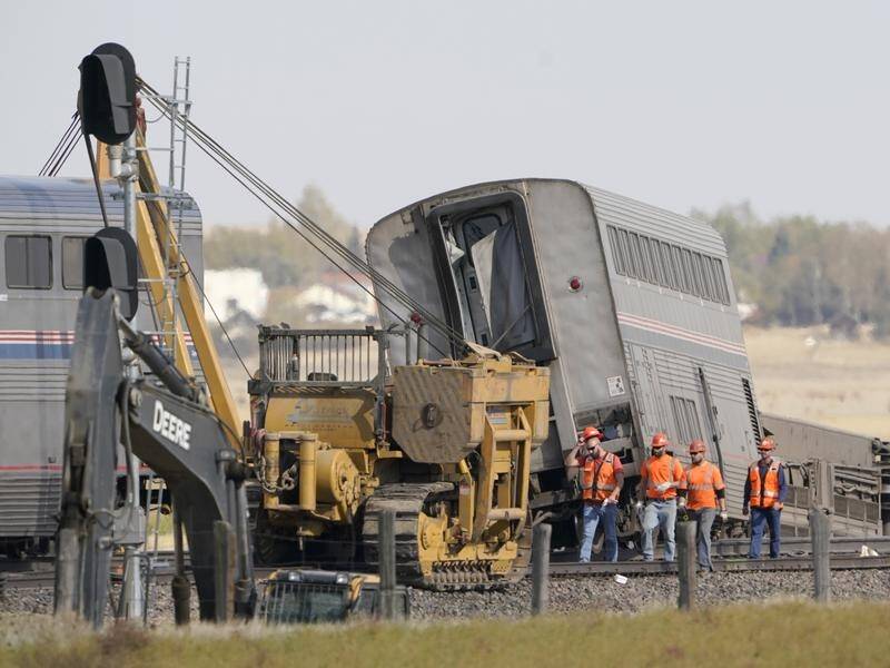 Investigators are onsite and recovery work underway following a deadly train derailment in the US.