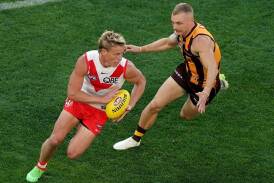 Isaac Heeney was instrumental as the Swans buried Hawthorn at the MCG. (Scott Barbour/AAP PHOTOS)